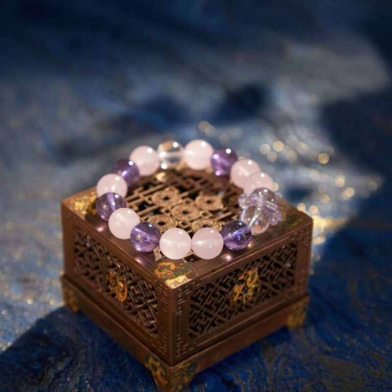 A Scorpio Zodiac crystal bracelet with Amethyst quartz beads.