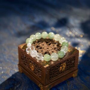 A Taurus Zodiac crystal bracelet with Green Fluorite quartz beads.