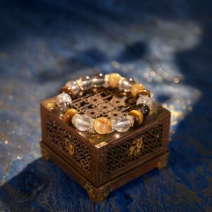 A Geng Metal crystal bracelet with yellow and phantom quartz beads.