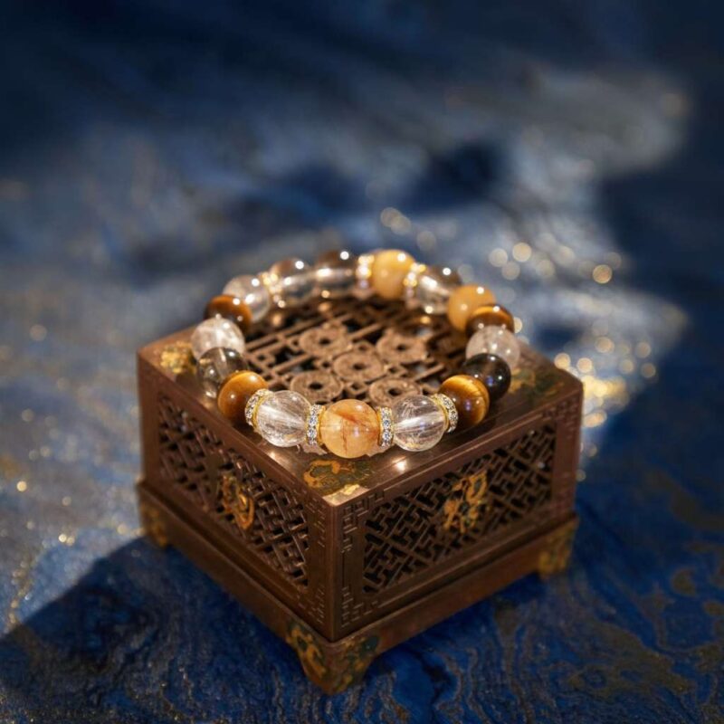 A Geng Metal crystal bracelet with yellow and phantom quartz beads.