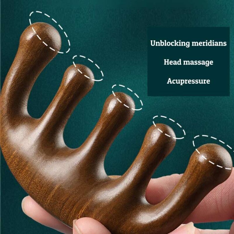 A close-up detail shot of the wide, rounded teeth of the sandalwood comb for a gentle and effective scalp massage.