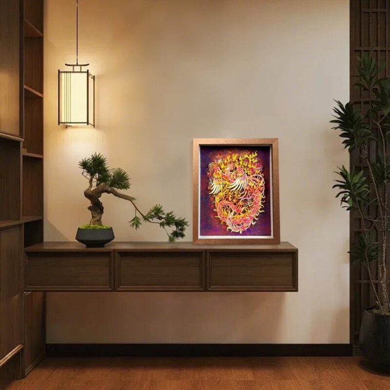 Elegant 3D Chinese Paper Cutting Fenghuang shadow box displayed on a rustic wooden stand, representing harmony and rebirth in Feng Shui decor.