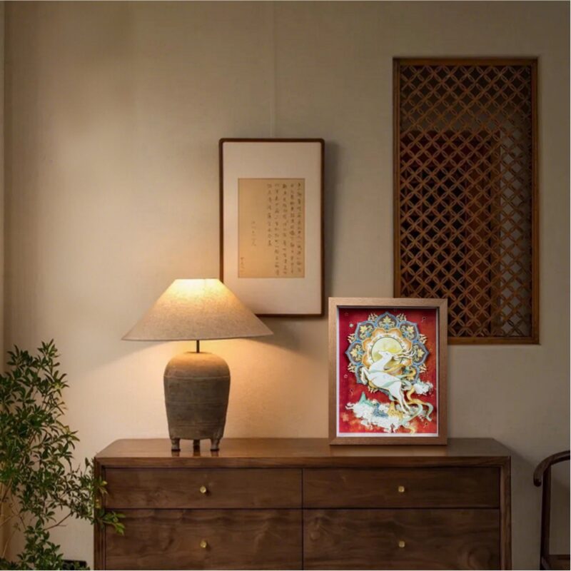 Elegant walnut framed 3D Chinese Paper Cutting artwork placed on a shelf, adding a touch of oriental Zen and Feng Shui fortune to the room.