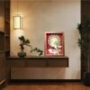 Elegant walnut framed 3D Chinese Paper Cutting artwork placed on a shelf, adding a touch of oriental Zen and Feng Shui fortune to the room.
