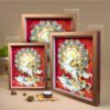 Elegant walnut framed 3D Chinese Paper Cutting artwork placed on a shelf, adding a touch of oriental Zen and Feng Shui fortune to the room.