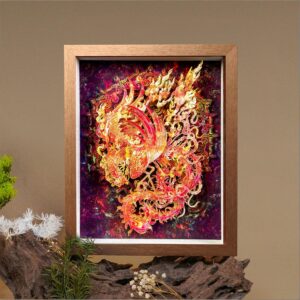 Woman holding a framed 3D Chinese Paper Cutting Vermilion Bird artwork, showing the colorful Phoenix facing the sun against a walnut wood frame.
