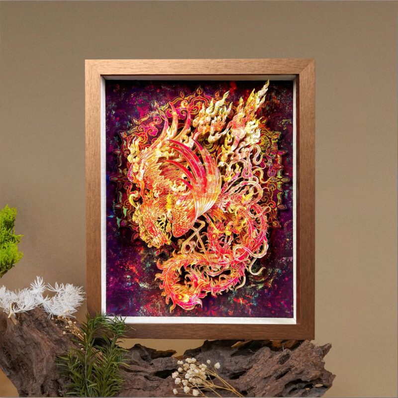 Woman holding a framed 3D Chinese Paper Cutting Vermilion Bird artwork, showing the colorful Phoenix facing the sun against a walnut wood frame.