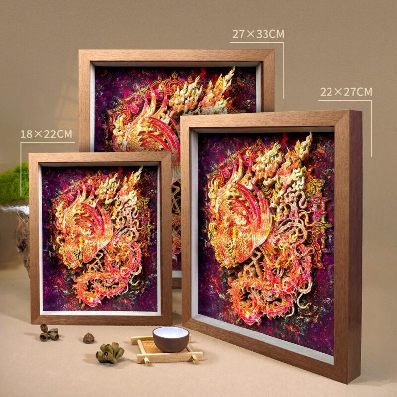 Close up of the 3D Chinese Paper Cutting Vermilion Bird, detailing the laser-carved plumage and the mythical fire symbolism of the Guardian of the South.