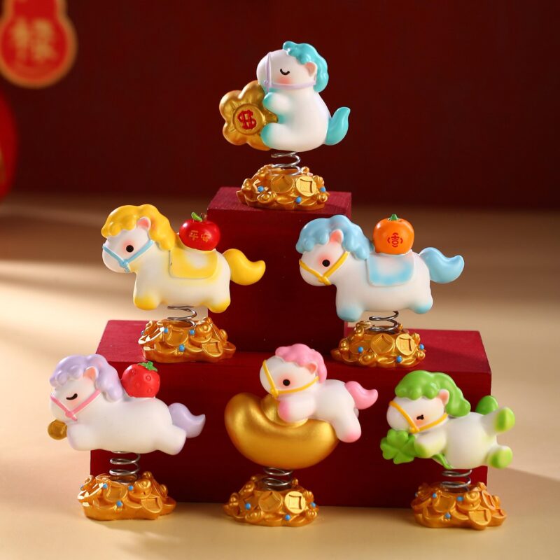 Collection of six Year of the Horse Creative Spring Ornament bobbleheads in various colors, featuring gold ingots, apples, and clovers for Lunar New Year car decor.