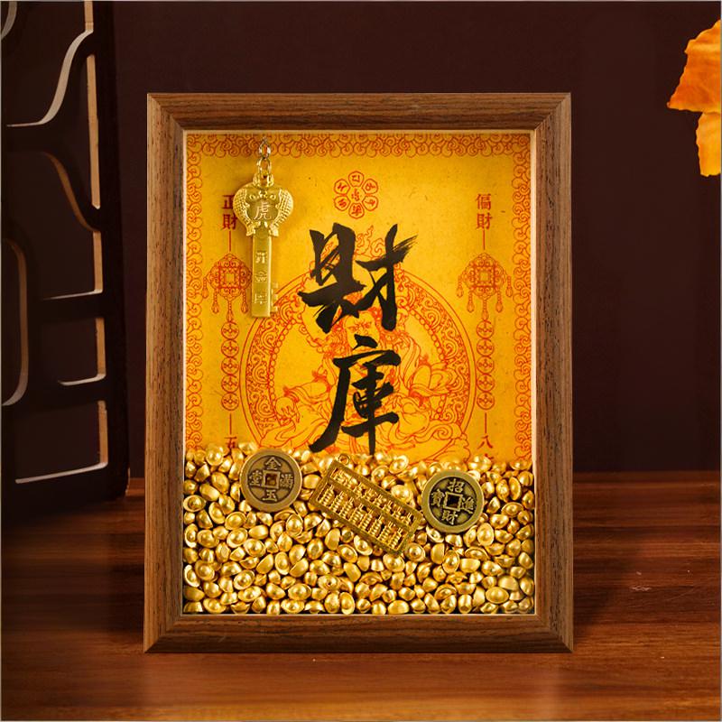 Close up diagram of the Feng Shui Wealth Opening Frame highlighting the Golden Key for opening the treasury, the Brass Abacus for calculation, and the Lucky Coins.