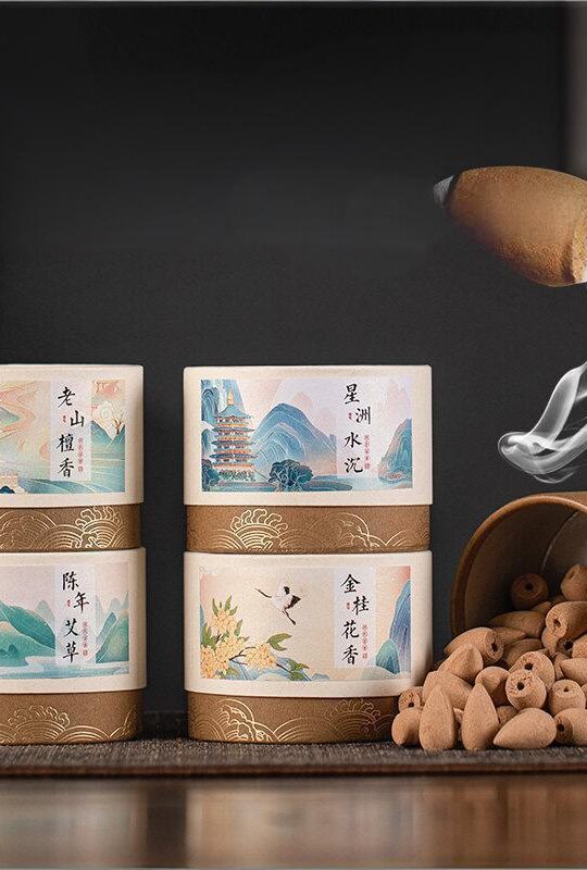 Packaging of Natural Waterfall Backflow Cones in various scents like Aged Mugwort and Sandalwood, displayed with a burning cone creating smoke.
